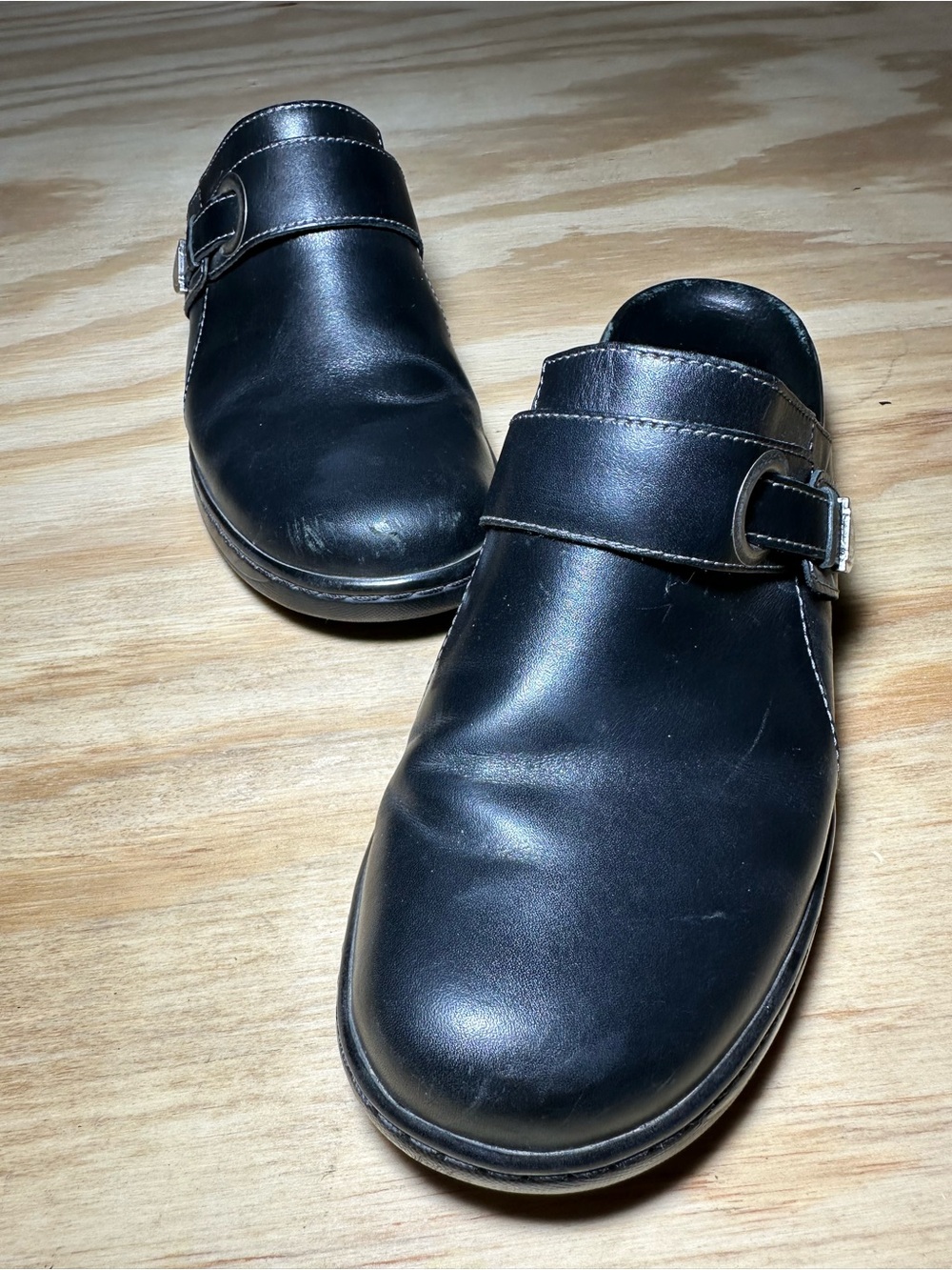 Clarks Black Leather Slip-On Mule with Buckle Accent